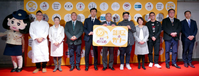 明治 松田克也社長（中央）、参加企業・店舗の代表者らが登壇