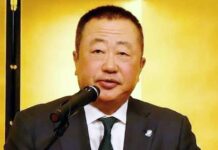 全清飲 業界の持続的発展へ 水分補給の重要性、資源循環を発信 あいさつする本庄大介会長