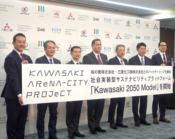 中央が味の素中村茂雄社長